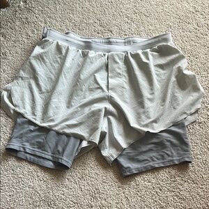 Men’s grey lululemon running shorts with compression shorts